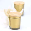 Μπομπονιέρα γάμου ή βάπτισης, αρωματικό κερί σε χρυσό ποτήρι με ξύλινο καπάκι και άρωμα amber